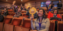 Personas en un auditorio